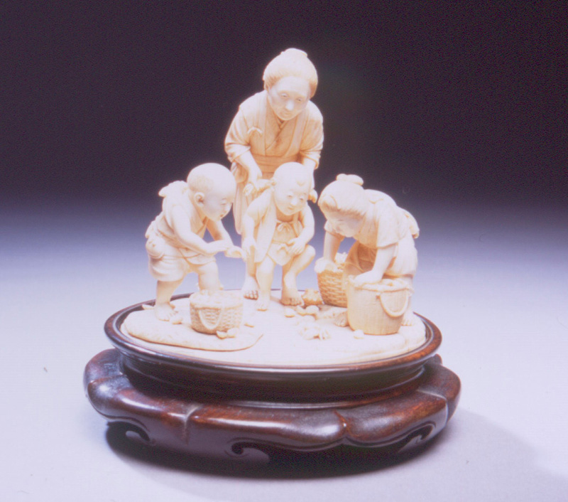 Grandmother With Children - Ivory Carving